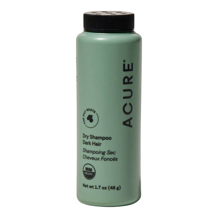 Acure dry shampoo bottle on a white background