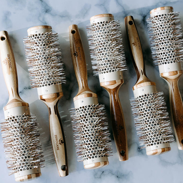Elegant and professional bamboo thermal blow-drying brushes that shapes, smooths, and volumises hair.