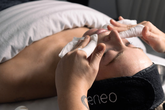 Esthetician performing a facial treatment at Damara Day Spa in Whistler