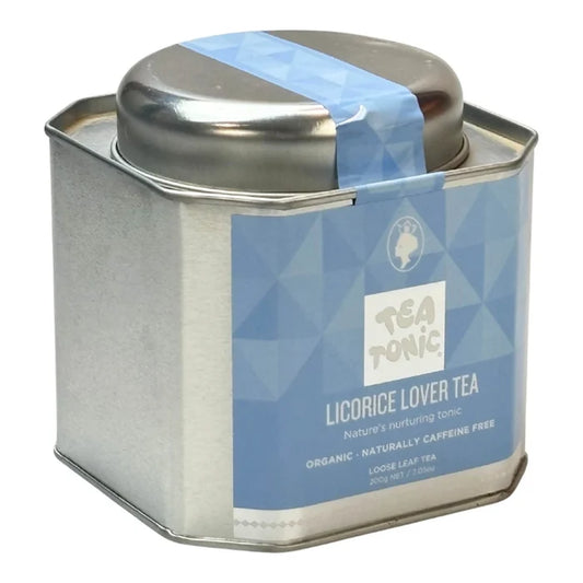 A square silver metal tin of Tea Tonic Licorice Lover Tea with a blue geometric label and a blue seal on the lid, set against a plain white background. Naturally caffeine free.
