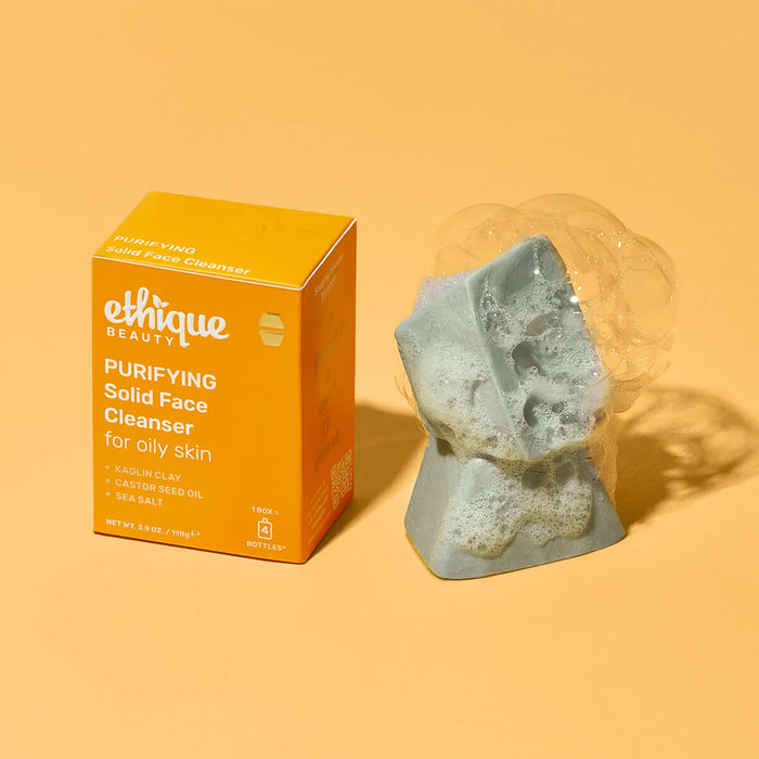 Ethique Purifying Solid Face Cleanser 110g box with foaming green bars.