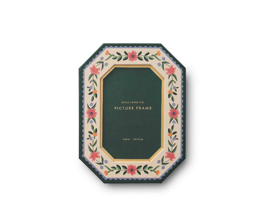 Decorative picture frame with floral design on a white background