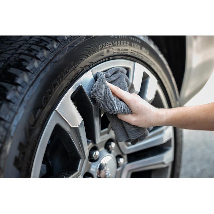 The Rag Company Edgeless 365 Miner Grey Towel Demo wiping tire.
